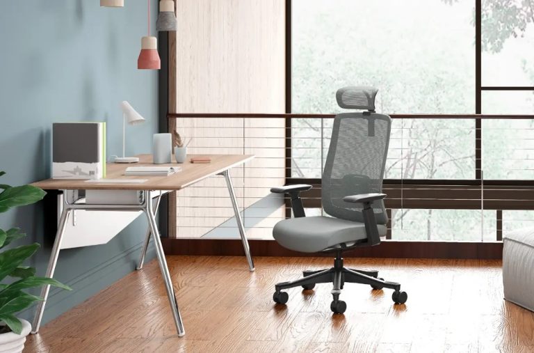 grey mesh chair alongside warm wood
